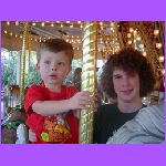 Bill and Noah on Merry Go Ground.jpg